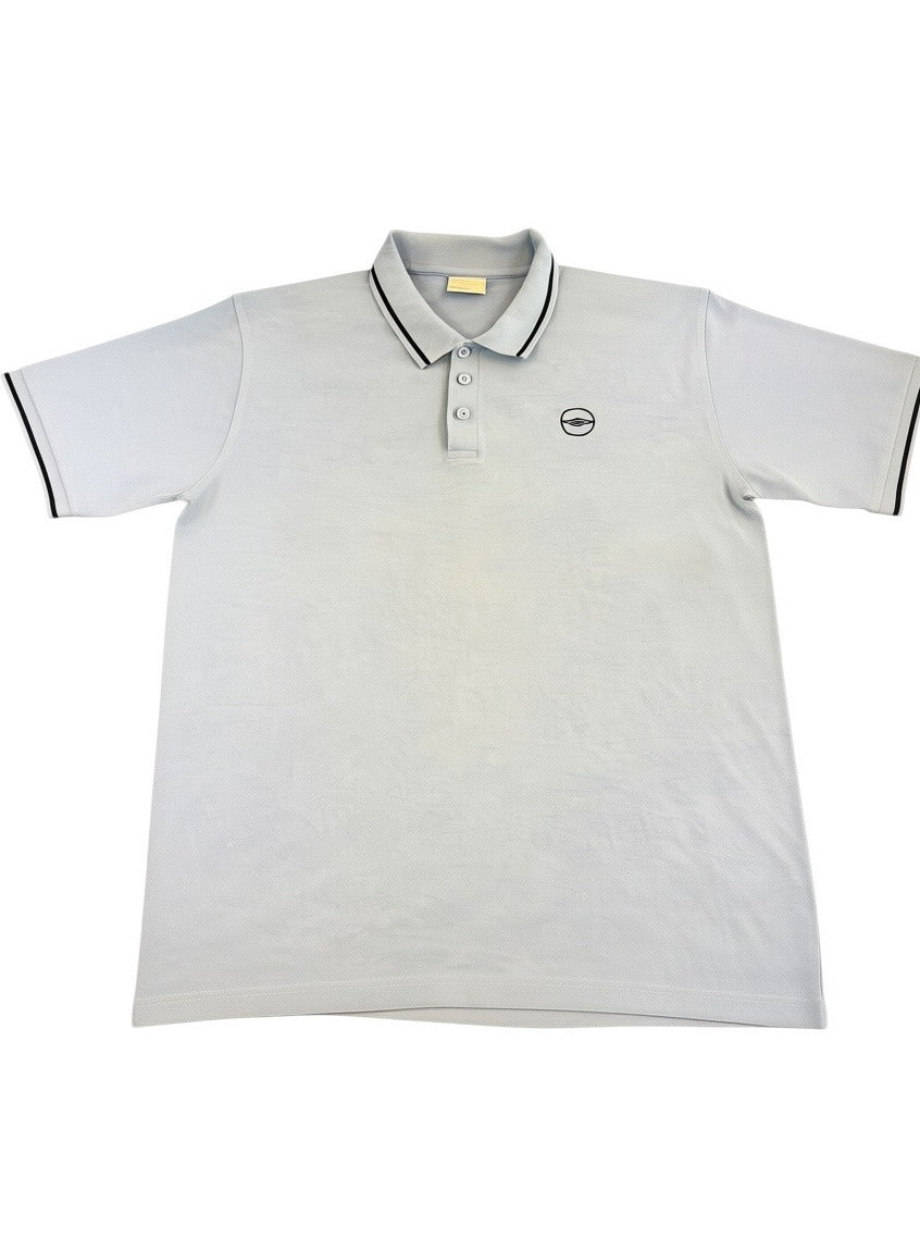 Lichtblauwe Umbro polo (sportshirt, korte mouw), maat XL