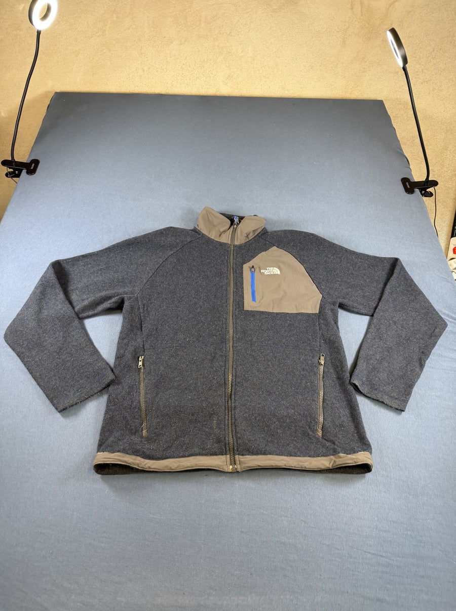 Blauw gemêleerd herenvest van The North Face (wolgebreide fleecetrui/fleecevest) maat M