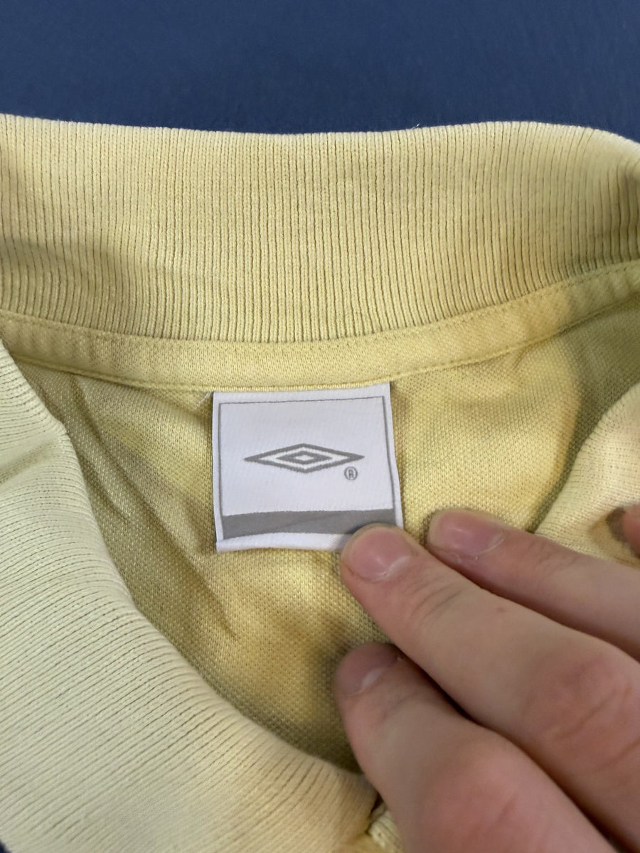 gele polo van Umbro, maat L (piqué top / golfshirt)