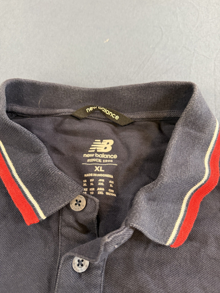 Blauw poloshirt (sportpolo) van New Balance, maat XL