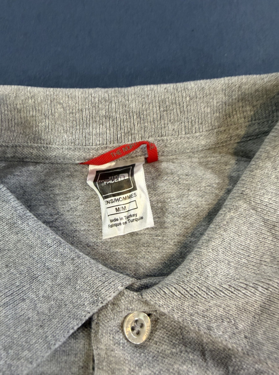 Grijze The North Face polo (piqué golfshirt), maat M