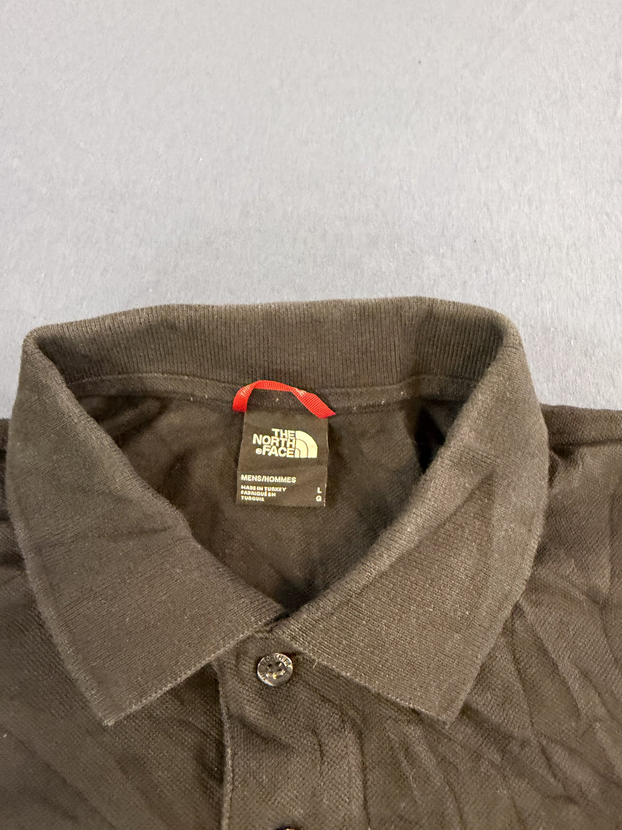 Zwarte The North Face polo (bedrijfspolo met Asus-logo), maat L