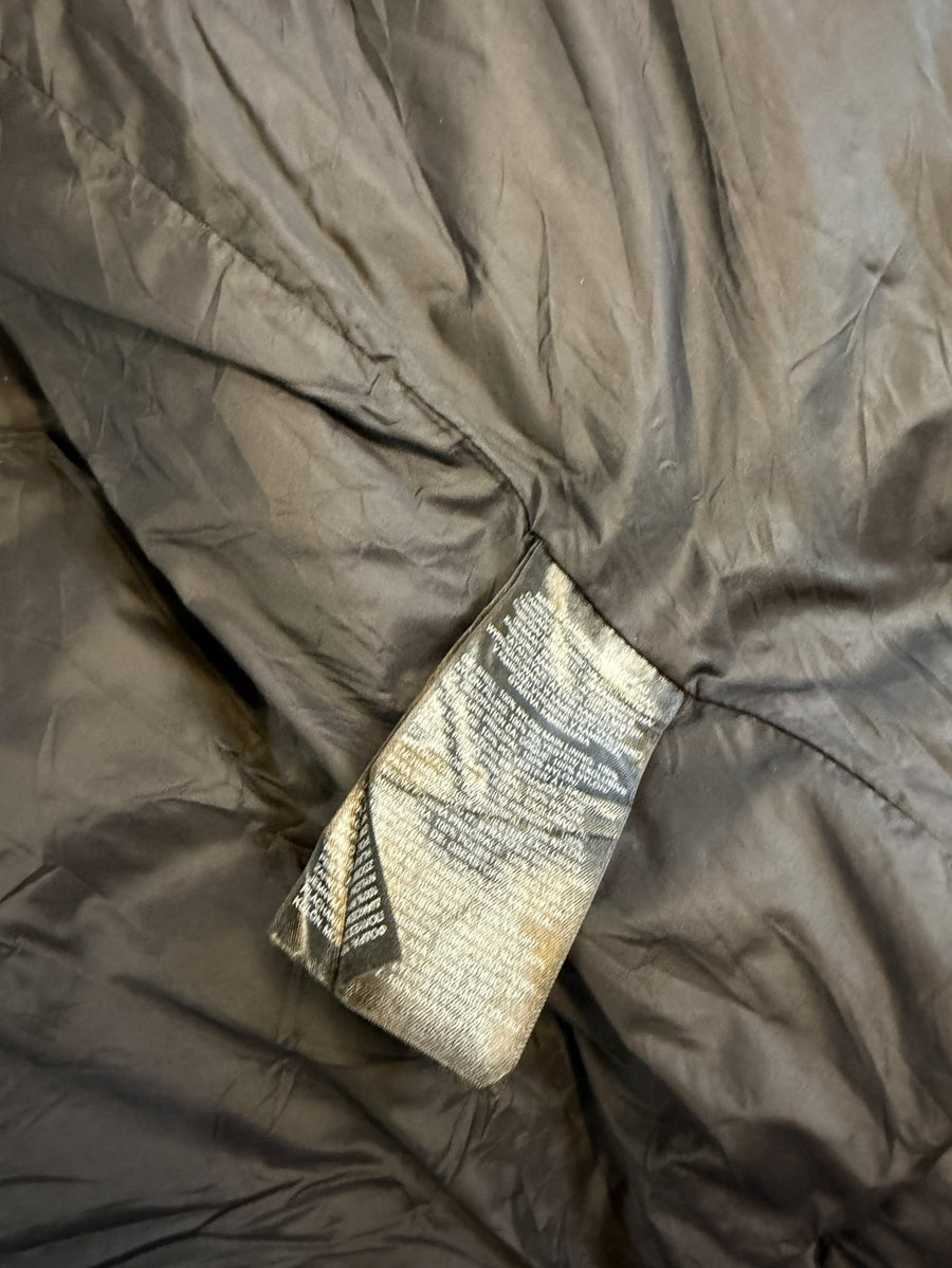 Zwarte jas van The North Face, maat M (gewatteerde tussenjas / puffer)