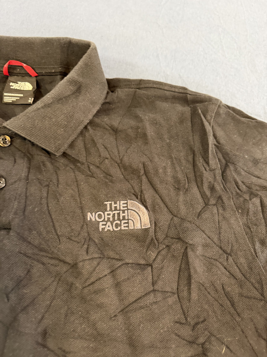 Zwarte The North Face polo (bedrijfspolo met Asus-logo), maat L