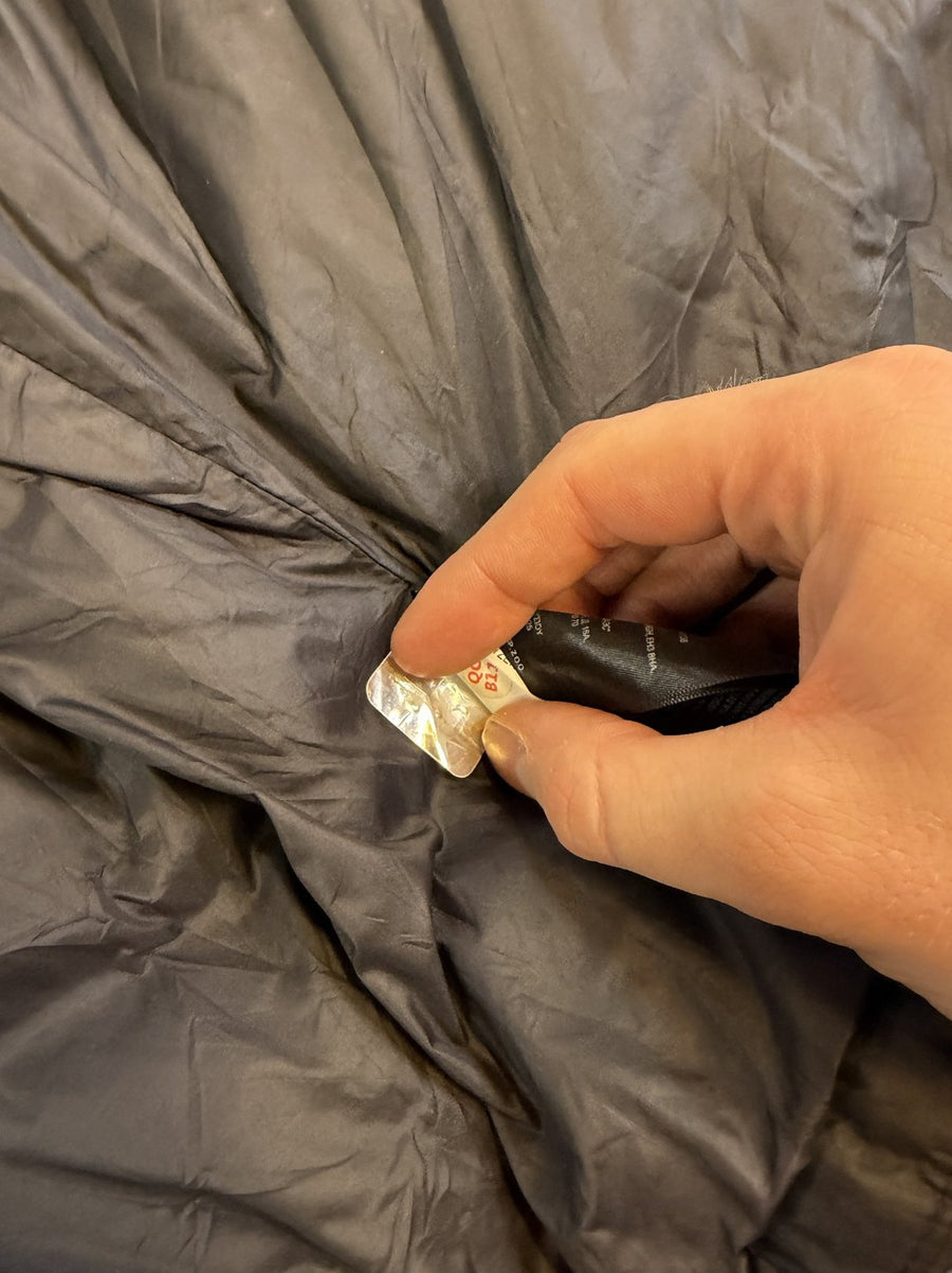 Zwarte jas van The North Face, maat M (gewatteerde tussenjas / puffer)
