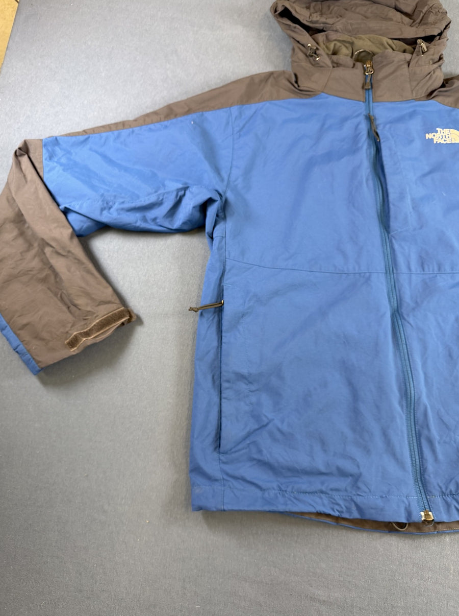 Blauwe outdoorjas van The North Face - maat M (shelljack / regenjack)
