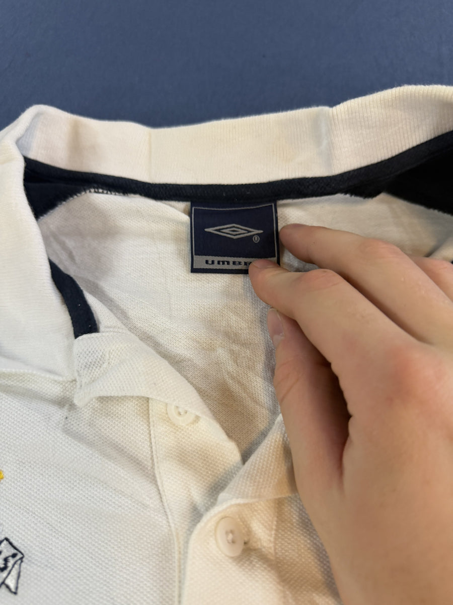 Umbro golfpolo R.A.F. St Athan wit navy maat XL