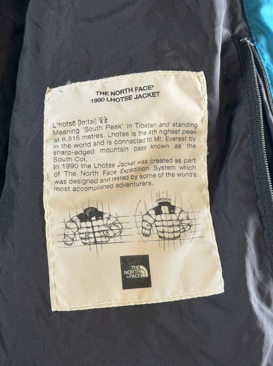 Blauwe The North Face jas, maat M (puffer jack / gewatteerde winterjas)