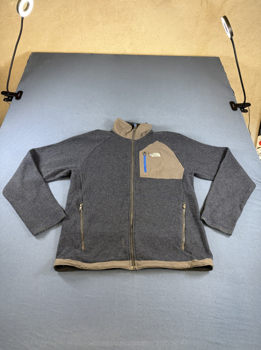 Blauw gemêleerd herenvest van The North Face (wolgebreide fleecetrui/fleecevest) maat M